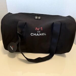 CHANEL Black Canvas Duffel Bag with White and Red Logo